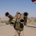 Teddy Treadwell clowning around with empty TOW missile tubes at Ali Al Salem airfield in Kuwait, Oct 2000.